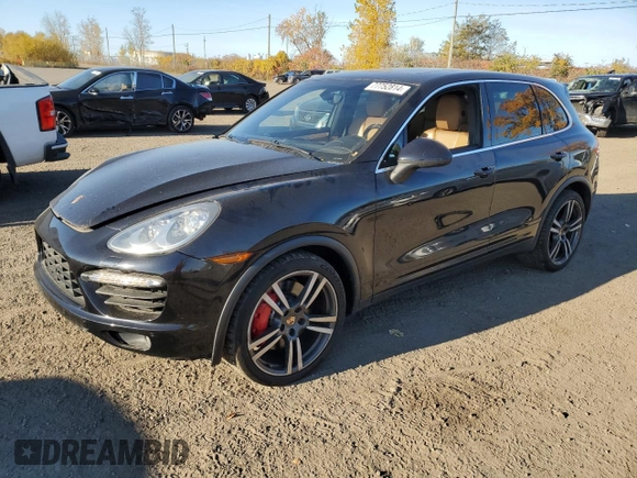 2012 Porsche Cayenne Turbo with VIN WP1AC2A26CLA82602, listed as a Copart auction lot 77752814 with 115,965 mi miles and Salvage title. Bid and sale history available at DreamBid. Image 1.