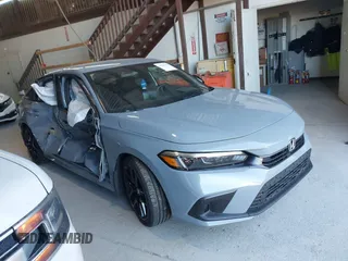 2023 Honda Civic Sedan Sport with VIN 2HGFE2F53PH549919, listed as a IAAI auction lot 41327433 with 14,591 mi miles. Bid and sale history available at carsss.com. Image 1.