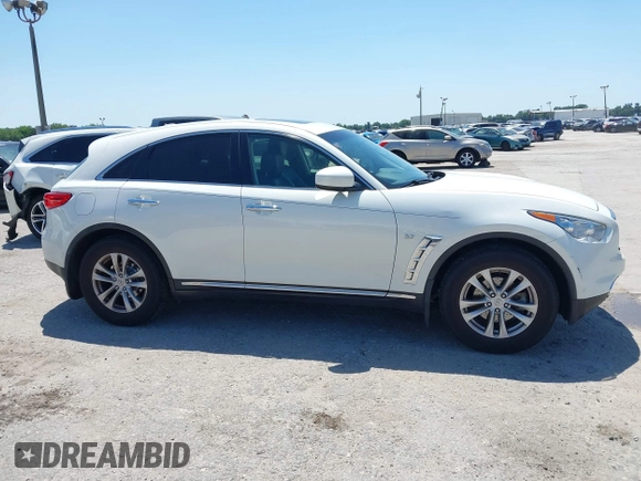 2014 Infiniti QX70 with VIN JN8CS1MU7EM451098, listed as a IAAI auction lot 42026803 with 126,605 mi miles and . Bid and sale history available at DreamBid. Image 13.