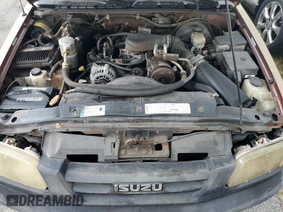 1998 Isuzu Hombre z VIN 1GGCS19X0W8650520, wystawiony jako Copart lot #73962444 z przebiegiem Nie podano mil oraz Szkoda całkowita • Salvage title. Historia ofert i sprzedaży dostępna na DreamBid. Obrazek 11.