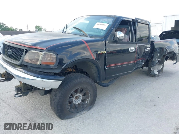 2003 Ford F-150 XLT z VIN 1FTRW08L73KA58913, wystawiony jako IAAI lot #41907277 z przebiegiem 147 294 mil mil oraz . Historia ofert i sprzedaży dostępna na DreamBid. Obrazek 20.