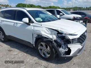 2023 Hyundai Santa Fe SEL z VIN 5NMS24AJ3PH656978, wystawiony jako IAAI lot #42172853 z przebiegiem 9 436 mil mil oraz . Historia ofert i sprzedaży dostępna na DreamBid. Obrazek 6.