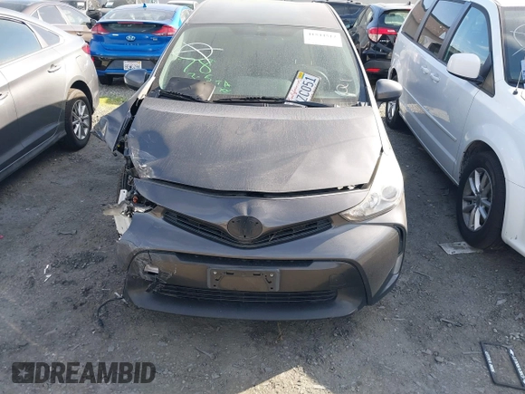 2017 Toyota Prius v Two with VIN JTDZN3EU6HJ057203, listed as a IAAI auction lot 41544512 with 116,663 mi miles. Bid and sale history available at carsss.com. Image 12.