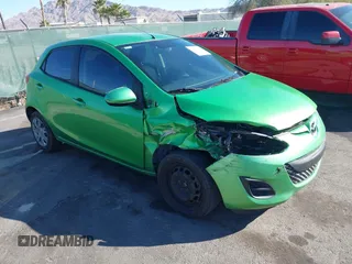 2012 Mazda 2 Sport with VIN JM1DE1KZ6C0147321, listed as a IAAI auction lot 41654811 with 123,081 mi miles. Bid and sale history available at carsss.com. Image 1.