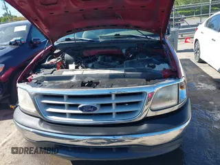 1999 Ford F-150 with VIN 1FTZF1723XNA23062, listed as a IAAI auction lot 42019826 with 232,648 mi miles and . Bid and sale history available at DreamBid. Image 10.