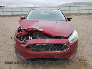 2017 Ford Focus SE with VIN 1FADP3F20HL254766, listed as a Copart auction lot 54068045 with 82,558 mi miles and Salvage title. Bid and sale history available at DreamBid. Image 5.