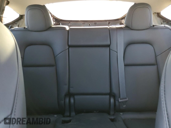 2024 Tesla Model Y with VIN 7SAYGDED3RF151031, listed as a Copart auction lot 49494165 with 7,503 mi miles and Salvage Title. Bid and sale history available at DreamBid. Image 10.