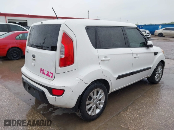 2012 Kia Soul + with VIN KNDJT2A69C7441065, listed as a IAAI auction lot 41821091 with 197,441 mi miles. Bid and sale history available at carsss.com. Image 4.