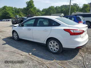 2012 Ford Focus SE with VIN 1FAHP3F21CL445400, listed as a Copart auction lot 58512535 with 142,515 mi miles and Salvage title. Bid and sale history available at DreamBid. Image 2.