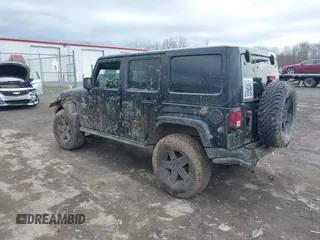 2012 Jeep Wrangler Unlimited Call of Duty MW3 z VIN 1C4BJWFG0CL202238, wystawiony jako IAAI lot #41956648 z przebiegiem 92 572 mil mil oraz . Historia ofert i sprzedaży dostępna na DreamBid. Obrazek 3.