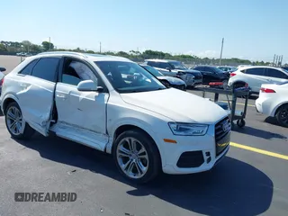 2016 Audi Q3 Premium Plus z VIN WA1BFCFS0GR014028, wystawiony jako IAAI lot #42274987 z przebiegiem 64 667 mil mil oraz . Historia ofert i sprzedaży dostępna na DreamBid. Obrazek 1.