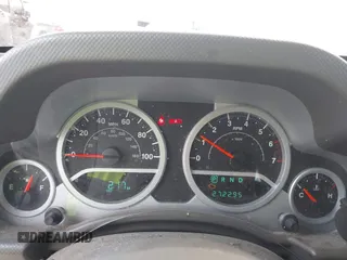 2008 Jeep Wrangler Unlimited Sahara with VIN 1J4GB59198L619802, listed as a IAAI auction lot 42361793 with 272,295 mi miles and . Bid and sale history available at DreamBid. Image 7.