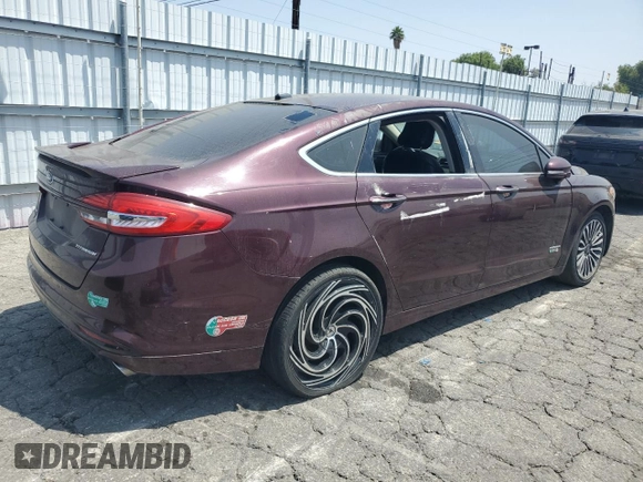 2017 Ford Fusion Titanium z VIN 3FA6P0SU8HR313773, wystawiony jako Copart lot #58791695 z przebiegiem 141 777 mil mil oraz Czysty tytuł • Clean title. Historia ofert i sprzedaży dostępna na DreamBid. Obrazek 3.