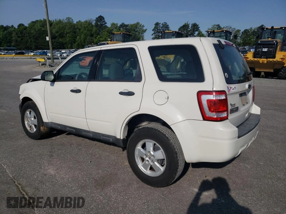 2010 Ford Escape XLS with VIN 1FMCU0C76AKB82752, listed as a Copart auction lot 57626565 with 194,931 mi miles and Salvage title. Bid and sale history available at DreamBid. Image 2.