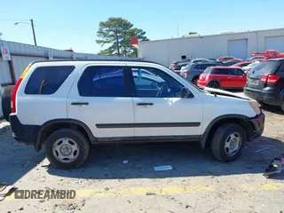 2002 Honda CR-V LX with VIN SHSRD68482U002257, listed as a IAAI auction lot 41644489 with 290,000 mi miles and . Bid and sale history available at carsss.com. Image 13.