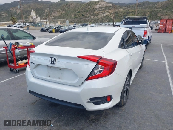 2018 Honda Civic EX with VIN 19XFC2F76JE206191, listed as a IAAI auction lot 41949231 with 146,118 mi miles and . Bid and sale history available at DreamBid. Image 4.