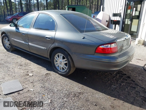 2004 Mercury Sable LS Premium z VIN 1MEHM55S54G607845, wystawiony jako IAAI lot #41812758 z przebiegiem 200 883 mil mil oraz . Historia ofert i sprzedaży dostępna na DreamBid. Obrazek 3.