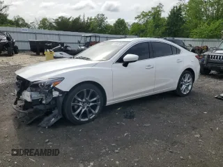 2016 Mazda 6 i Grand Touring с VIN JM1GJ1W56G1446467, выставлен на аукционе Copart как лот 56961505 с пробегом 87 331 миль миль и Списание • Salvage title. История ставок и продаж доступна на DreamBid. Изображение 1.