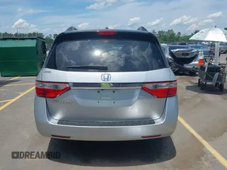 2012 Honda Odyssey EX-L with VIN 5FNRL5H65CB076534, listed as a IAAI auction lot 42440258 with 150,866 mi miles and . Bid and sale history available at DreamBid. Image 17.