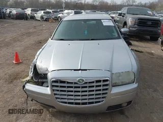 2005 Chrysler 300 with VIN 2C3JA53G85H159623, listed as a IAAI auction lot 41773424 with 127,764 mi miles. Bid and sale history available at carsss.com. Image 10.