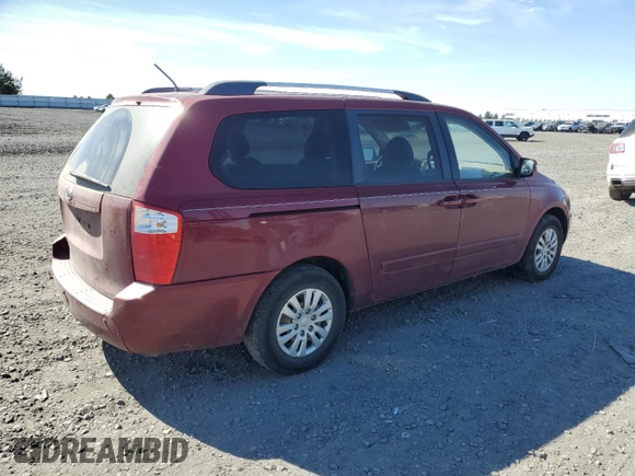 2012 Kia Sedona LX with VIN KNDMG4C74C6433769, listed as a Copart auction lot 69897564 with 161,793 mi miles and Salvage Title. Bid and sale history available at carsss.com. Image 3.