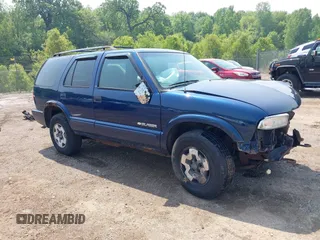 2002 Chevrolet Blazer LS with VIN 1GNDT13W12K197063, listed as a IAAI auction lot 42436248 with 186,318 mi miles and . Bid and sale history available at DreamBid. Image 1.