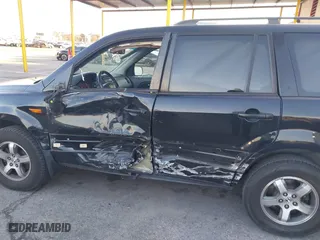 2006 Honda Pilot EX-L with RES with VIN 5FNYF28616B029670, listed as a IAAI auction lot 41425494 with 206,756 mi miles. Bid and sale history available at carsss.com. Image 6.