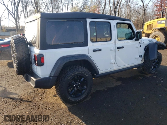 2023 Jeep Wrangler Willys with VIN 1C4HJXDG5PW543450, listed as a Copart auction lot 78455624 with 30,595 mi miles and Salvage Title. Bid and sale history available at DreamBid. Image 3.