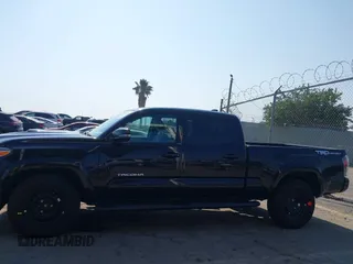 2022 Toyota Tacoma SR5 with VIN 3TMBZ5DN6NM034630, listed as a IAAI auction lot 42733932 with 43,309 mi miles and . Bid and sale history available at DreamBid. Image 14.