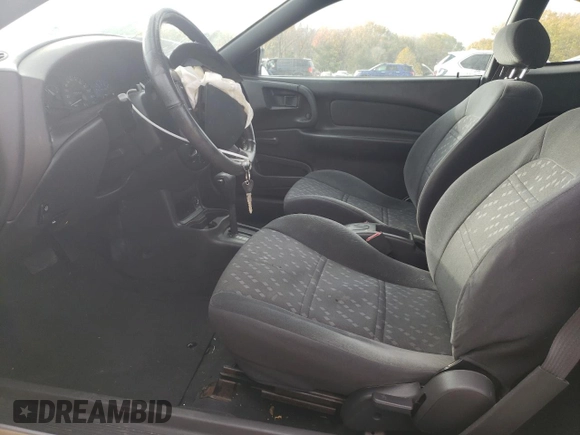 2003 Ford ZX2 ZX2 Standard z VIN 3FAFP11363R131724, wystawiony jako Copart lot #83448064 z przebiegiem 52 718 mil mil oraz Szkody całkowita. Historia ofert i sprzedaży dostępna na DreamBid. Obrazek 7.