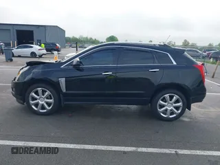2015 Cadillac SRX Performance Collection with VIN 3GYFNCE3XFS638994, listed as a IAAI auction lot 42243558 with 141,704 mi miles and . Bid and sale history available at DreamBid. Image 14.