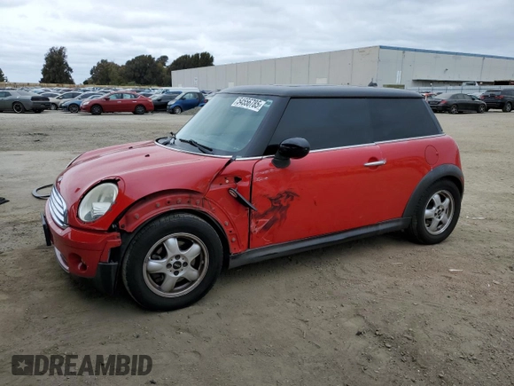 2009 MINI Hardtop with VIN WMWMF33519TW77558, listed as a Copart auction lot 54556785 with 97,749 mi miles and Salvage Title. Bid and sale history available at DreamBid. Image 1.