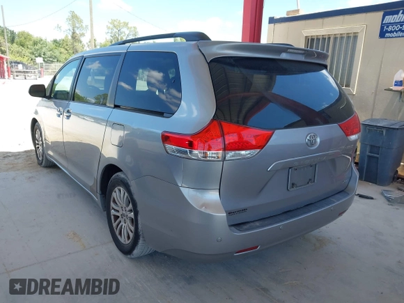 2011 Toyota Sienna XLE AAS with VIN 5TDYK3DC1BS007820, listed as a IAAI auction lot 41935200 with 123,554 mi miles. Bid and sale history available at carsss.com. Image 3.