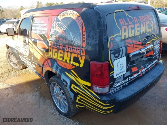 2011 Dodge Nitro SXT with VIN 1D4PU5GK9BW535743, listed as a IAAI auction lot 41200573 with 155,239 mi miles. Bid and sale history available at carsss.com. Image 3.