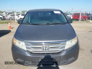 2012 Honda Odyssey EX-L with VIN 5FNRL5H6XCB061026, listed as a IAAI auction lot 42574612 with 144,480 mi miles and . Bid and sale history available at DreamBid. Image 6.