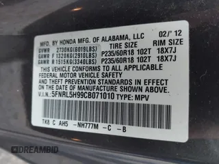 2012 Honda Odyssey Touring with VIN 5FNRL5H99CB071010, listed as a IAAI auction lot 41651233 with 186,913 mi miles. Bid and sale history available at carsss.com. Image 9.