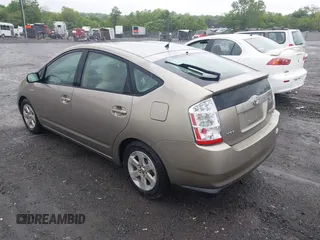 2006 Toyota Prius z VIN JTDKB20U067517414, wystawiony jako IAAI lot #42251158 z przebiegiem 233 266 mil mil oraz . Historia ofert i sprzedaży dostępna na DreamBid. Obrazek 3.