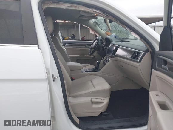2019 Volkswagen Atlas SE z VIN 1V2WR2CA9KC593891, wystawiony jako IAAI lot #41947078 z przebiegiem 74 525 mil mil oraz . Historia ofert i sprzedaży dostępna na DreamBid. Obrazek 5.