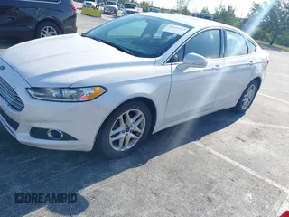 2014 Ford Fusion SE with VIN 3FA6P0HD5ER273039, listed as a IAAI auction lot 42221553 with 82,755 mi miles and . Bid and sale history available at DreamBid. Image 2.