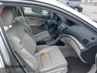 2010 Acura TSX with VIN JH4CU2F60AC019462, listed as a IAAI auction lot 42109261 with 112,131 mi miles. Bid and sale history available at carsss.com. Image 5.