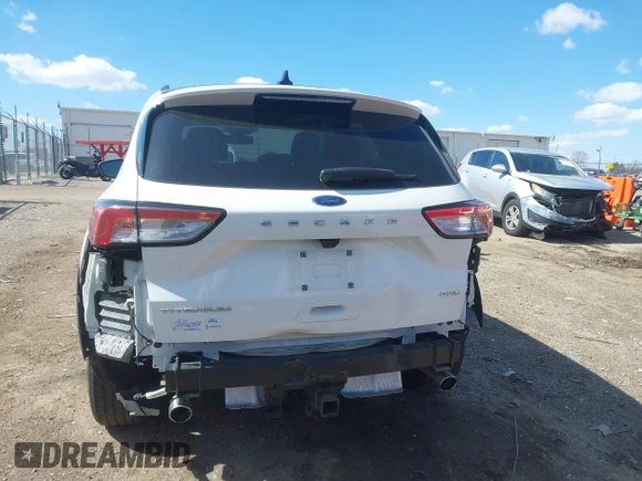 2022 Ford Escape Titanium with VIN 1FMCU9J93NUA99685, listed as a IAAI auction lot 41867437 with 36,987 mi miles and . Bid and sale history available at DreamBid. Image 17.