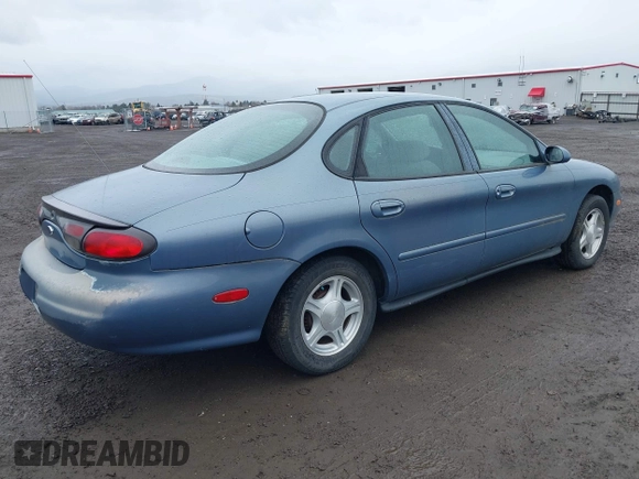 1999 Ford Taurus SE with VIN 1FAFP53U5XG190788, listed as a IAAI auction lot 41880104 with 68,810 mi miles and . Bid and sale history available at DreamBid. Image 4.