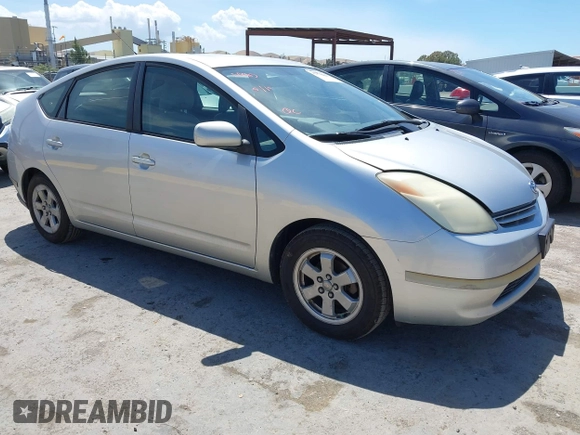 2004 Toyota Prius z VIN JTDKB20U640005484, wystawiony jako IAAI lot #42255569 z przebiegiem 240 334 mil mil oraz . Historia ofert i sprzedaży dostępna na DreamBid. Obrazek 1.