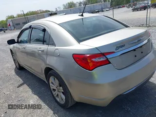 2013 Chrysler 200 Touring with VIN 1C3CCBBB9DN632877, listed as a IAAI auction lot 41935934 with 156,677 mi miles. Bid and sale history available at carsss.com. Image 3.