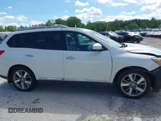 2015 Nissan Pathfinder Platinum z VIN 5N1AR2MM0FC613659, wystawiony jako IAAI lot #42194214 z przebiegiem 138 180 mil mil oraz . Historia ofert i sprzedaży dostępna na DreamBid. Obrazek 13.
