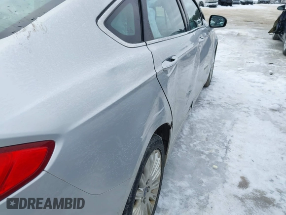 2014 Ford Fusion SE Hybrid with VIN 3FA6P0LUXER172442, listed as a IAAI auction lot 41623540 with 195,843 mi miles. Bid and sale history available at carsss.com. Image 6.