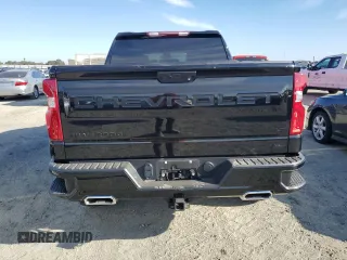 2023 Chevrolet Silverado 1500 LT Trail Boss with VIN 3GCUDFE80PG263652, listed as a Copart auction lot 72004854 with 25,461 mi miles and Salvage Title. Bid and sale history available at DreamBid. Image 6.