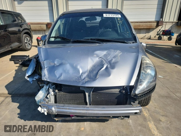 2007 Honda Fit with VIN JHMGD38407S066833, listed as a Copart auction lot 61713125 with 62,917 mi miles and Salvage title. Bid and sale history available at DreamBid. Image 5.