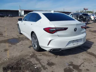 2023 Acura TLX w/Advance Package with VIN 19UUB6F65PA003881, listed as a IAAI auction lot 41360237 with 12,905 mi miles. Bid and sale history available at carsss.com. Image 3.