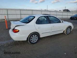 2000 Hyundai Elantra GLS z VIN KMHJF35F4YU038977, wystawiony jako Copart lot #80800144 z przebiegiem 97 373 mil mil oraz Czysty tytuł • Clean title. Historia ofert i sprzedaży dostępna na DreamBid. Obrazek 3.